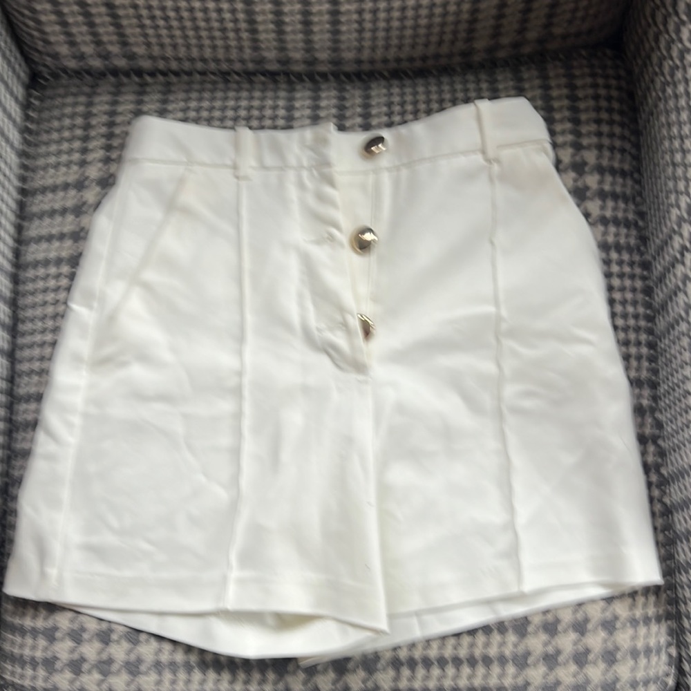 Zara white big gold button shorts.